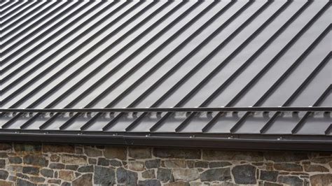 cost of metal standing sean roof for 7000 sf house|stainless steel roof cost.